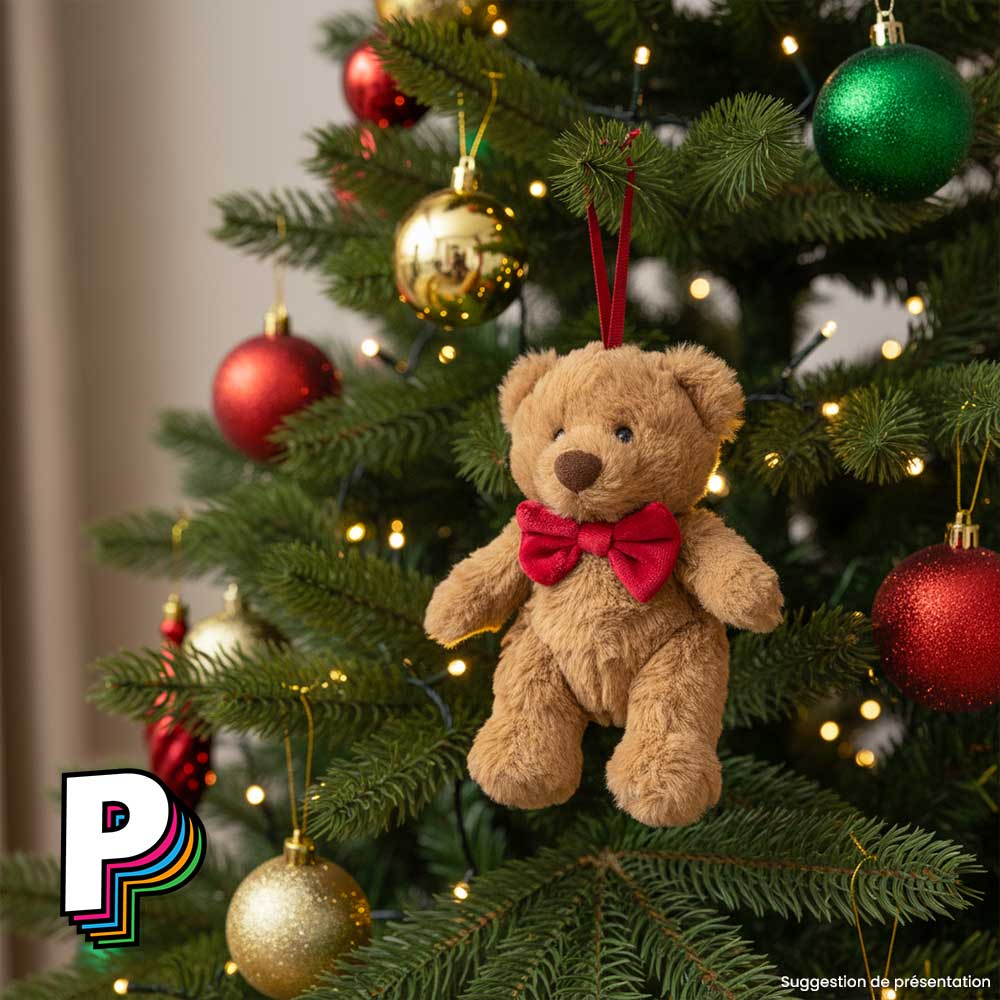 Peluche ourson Bartholomew à suspendre de Jellycat dans un sapin de Noël