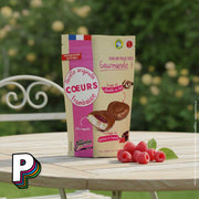 Cœur Caramel Framboise des Craquelins de Saint-Malo sur table avec framboise