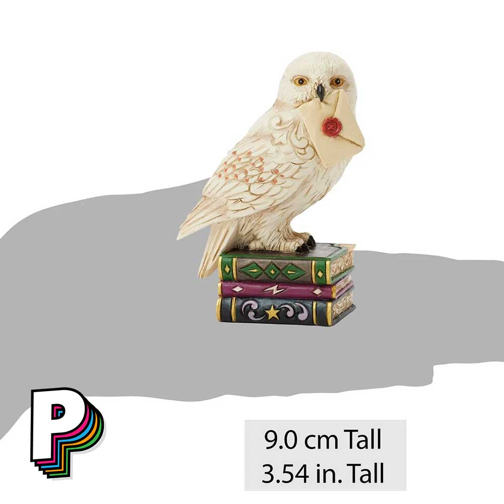 Figurine Hedwige sur livres chouette de Harry Potter by Jim Shore taille