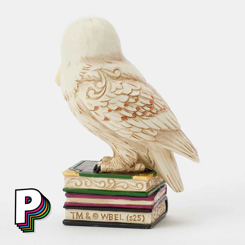Figurine Hedwige sur livres chouette de Harry Potter by Jim Shore de côté