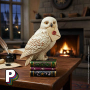 Figurine Hedwige sur livres chouette de Harry Potter by Jim Shore illustration poudlard