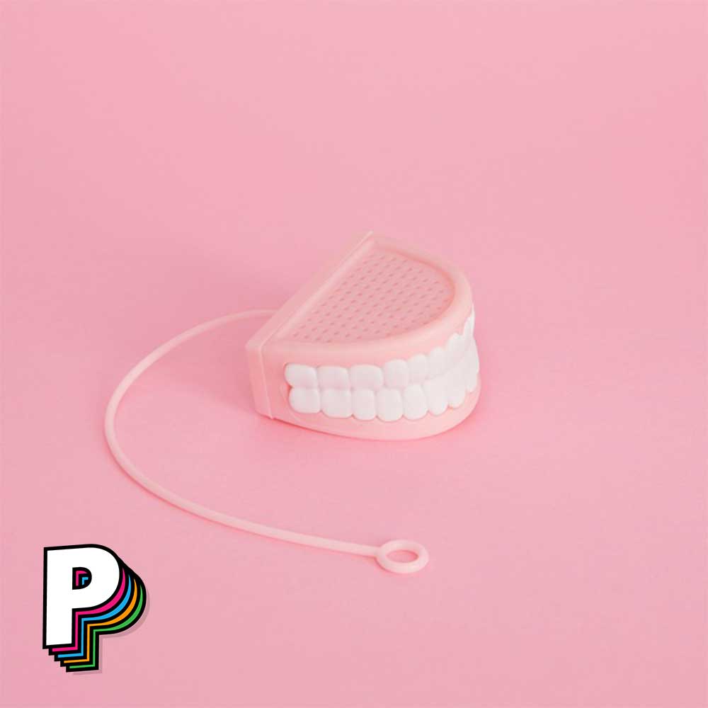 Infuseur thé dentier rose et blanc en silicone