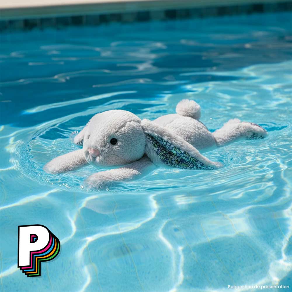 Peluche lapin gris blossom silver de Jellycat en train de nager (illustration)