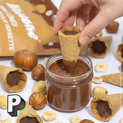 Mini cônes fourrés au chocolat noisette de Bitecone trempé dans pate à tartiner