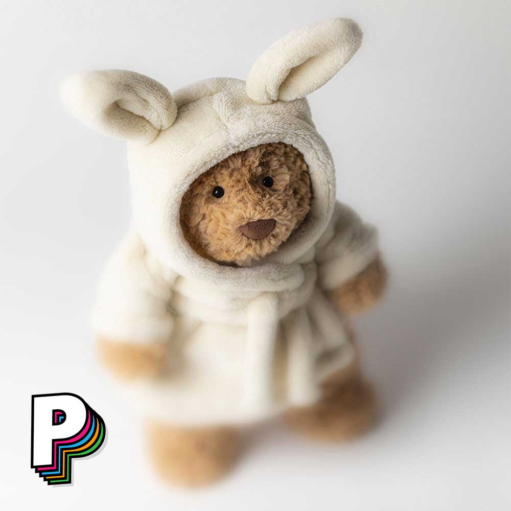 Détail peluche ours peignoir lapin enfant