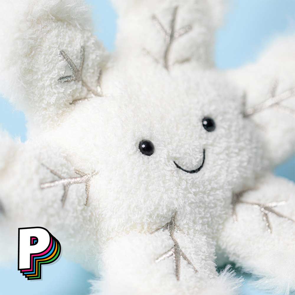 Détails visage flocon neige doudou