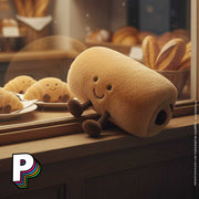 peluche pain au chocolat avec les croissants Jellycat dans vitrine de la boulangerie Jellycat