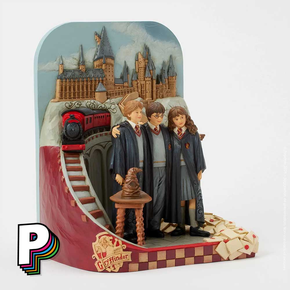 Figurine Trio Harry Ron Hermione Château Poudlard de Harry Potter avec détails écusson Gryffindor