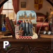 Figurine Trio Harry Ron Hermione Château Poudlard de Harry Potter dans chambre de sorcier